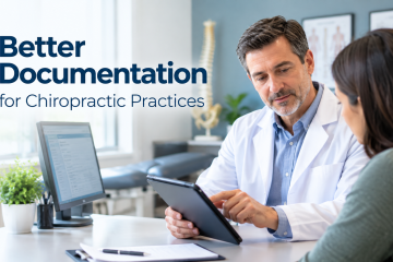 Chiropractor reviewing patient documentation in a professional chiropractic office